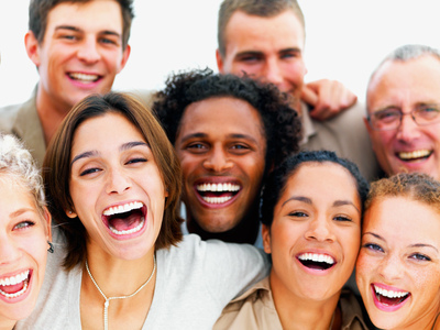 closeup portrait of a group of business people laughing © Richard foster - flickr.com